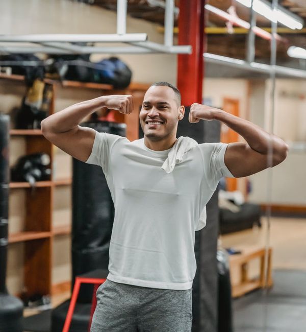 A man feeling energetic and vital after a workout.