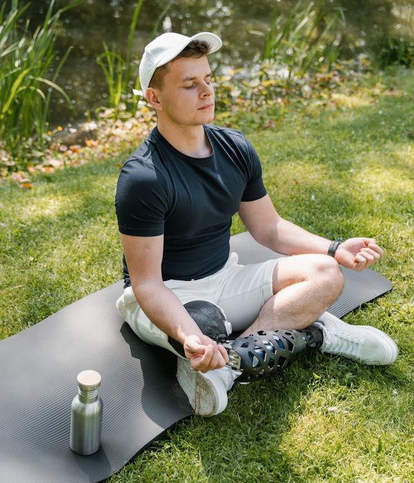 Man performing a strength exercise in a calm environment.